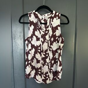 Sleeveless maroon floral shirt